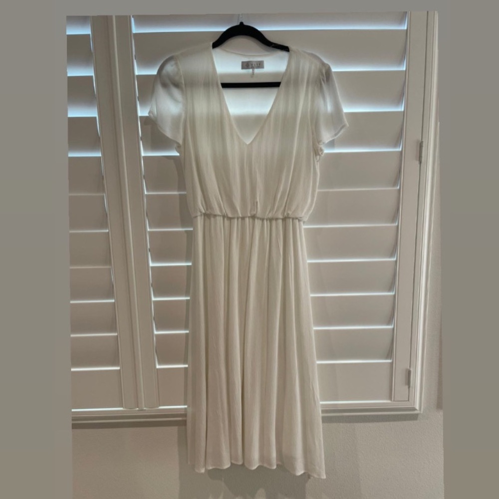 White V-Neck Dress with cinched waist